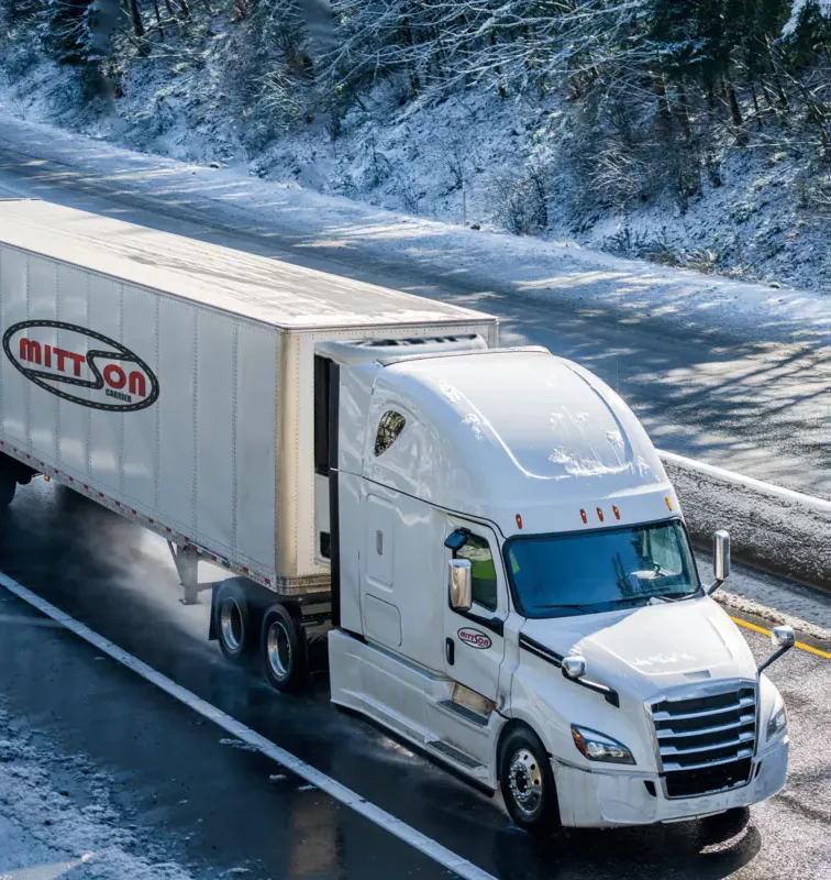 Mittson truck driving on highway